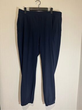 LULULEMON JOGGER PANTS. Navy. Size 14. Zippers on the leg. No flaws. 28” inseam.